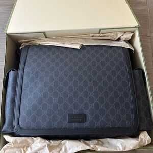 Gucci GG authentic diaper/messenger bag with baby mat, box, and original tags!